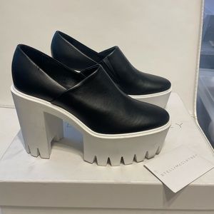 New Stella McCartney black leather pumps